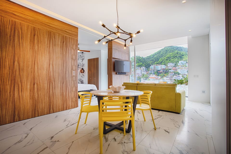 seating for 4 in the open kitchen....sliding wall separates bedroom