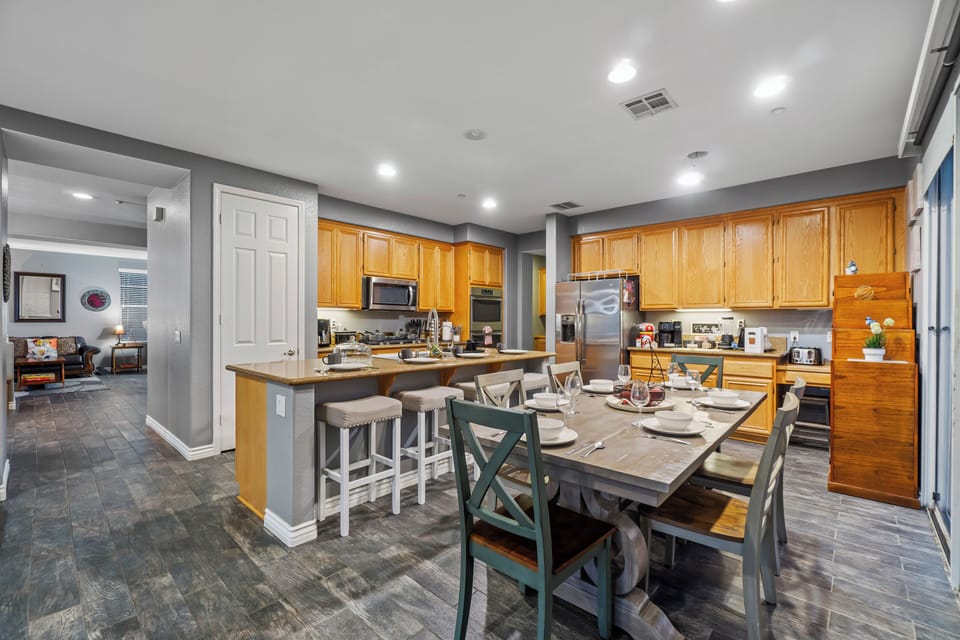 A spacious kitchen island and dining table, perfect for cooking and gathering!