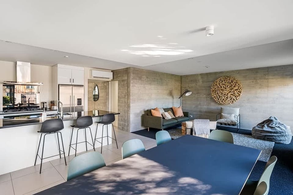 Dine In, in Style
Gather around this sleek dining table, designed for comfort and style. Whether you’re preparing a meal in the brand new kitchen or bringing home a gourmet dish from Queenstown’s dining hotspots.