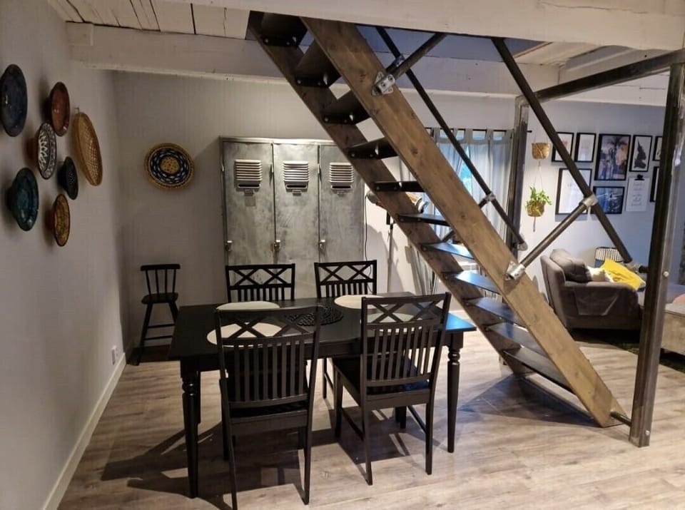 Dining room area with extendable table and extra chairs if needed. 
