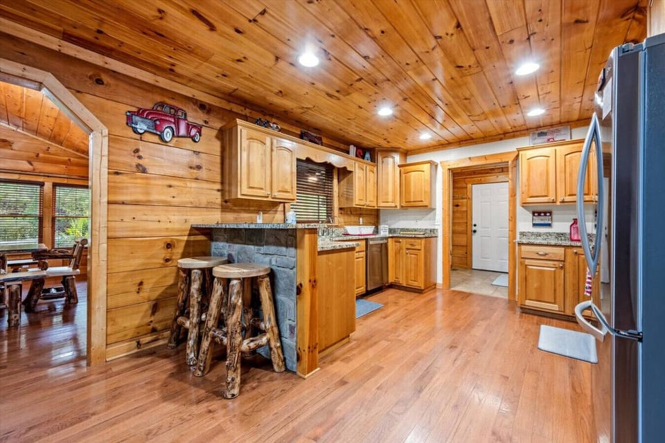 The large kitchen area includes plenty of space for the aspiring chefs in your group to make meals at the cabin. There is also plenty of countertop space for take out from any of the wonderful local restaurants.