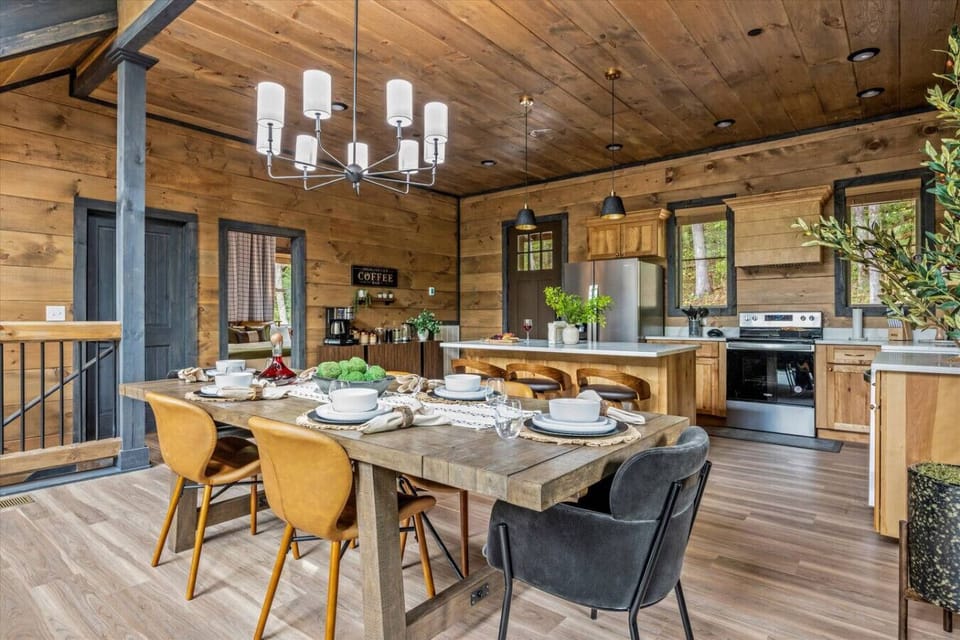 The dining area is conveniently located just off the kitchen. There is additional countertop bar seating.