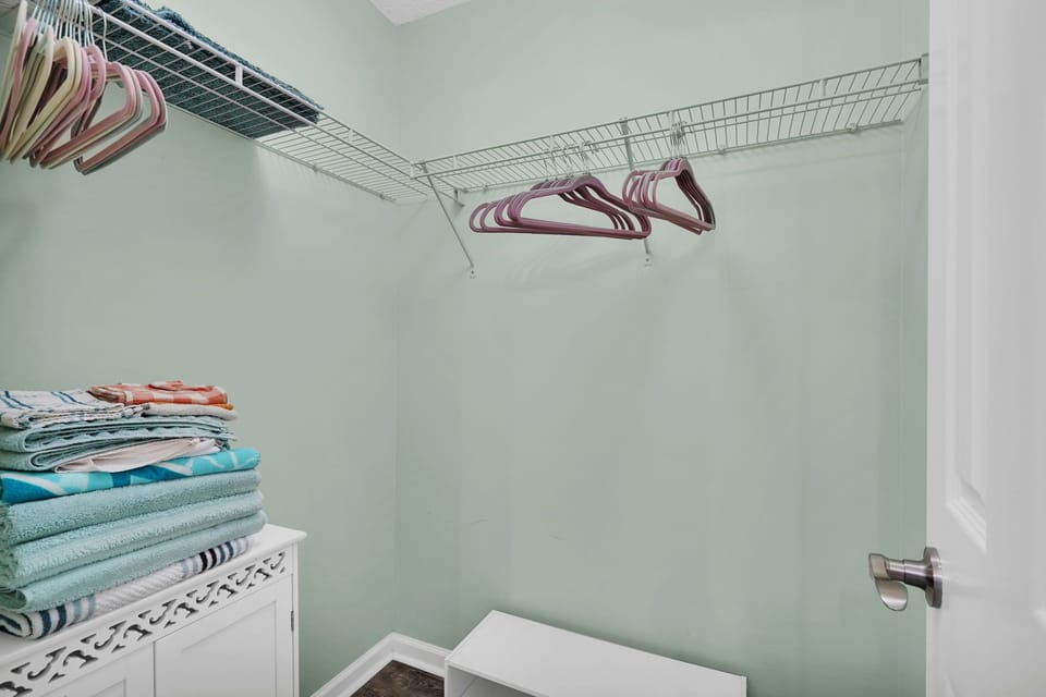 Large closet for guest storage in king bedroom