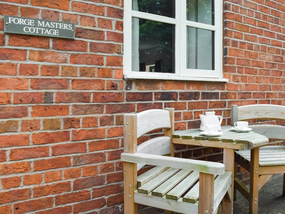 Sitting-out-area | Forge Masters Cottage - Forge Mill Farm, Middlewich