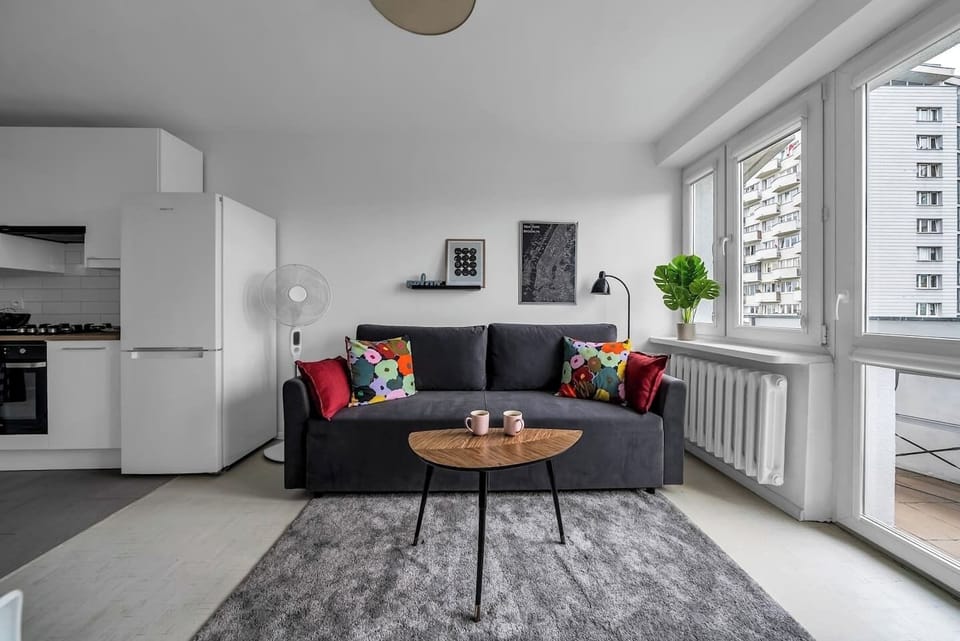Comfortable Living Room with Sofa Bed and Smart TV | Book Now with RENTUJEMY