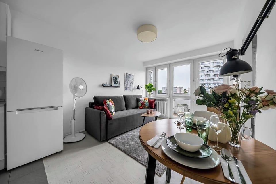 Comfortable Living Room with Sofa Bed and Smart TV | Book Now with RENTUJEMY