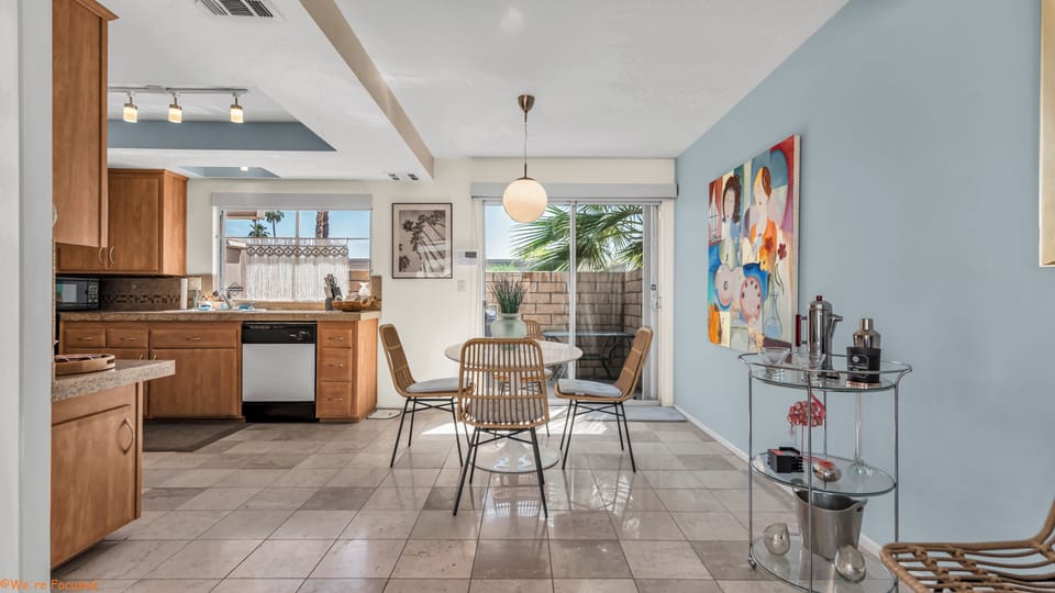 Indoor and outdoor dining for four.