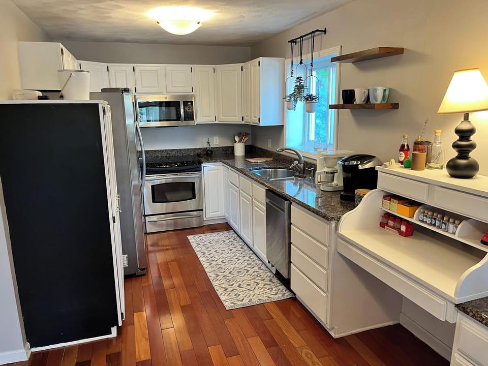 Main floor full kitchen with k cups/coffee and tea provided.