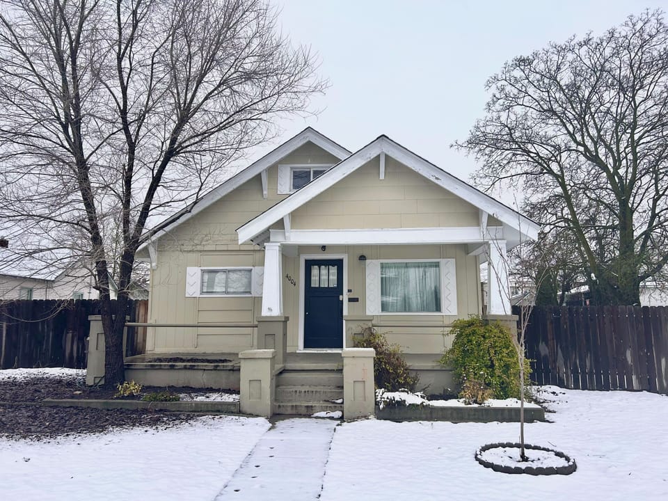 Exterior view of The Garland House blanketed in fresh snow.