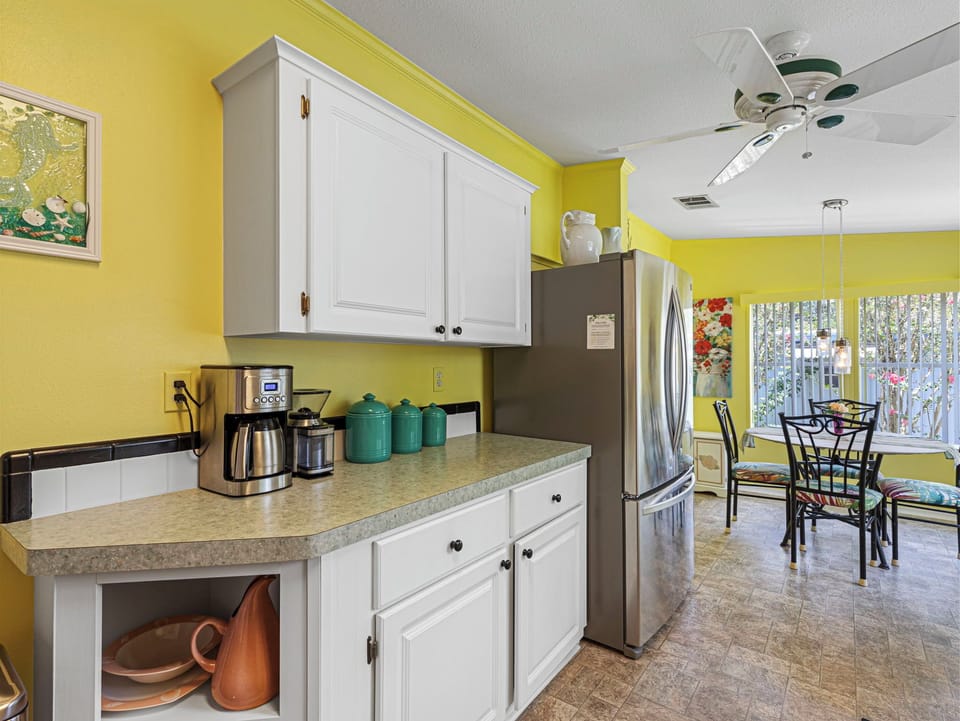 Fresh coffee beans, grinder, fresh tea leaves, kettle, toaster oven, ice maker