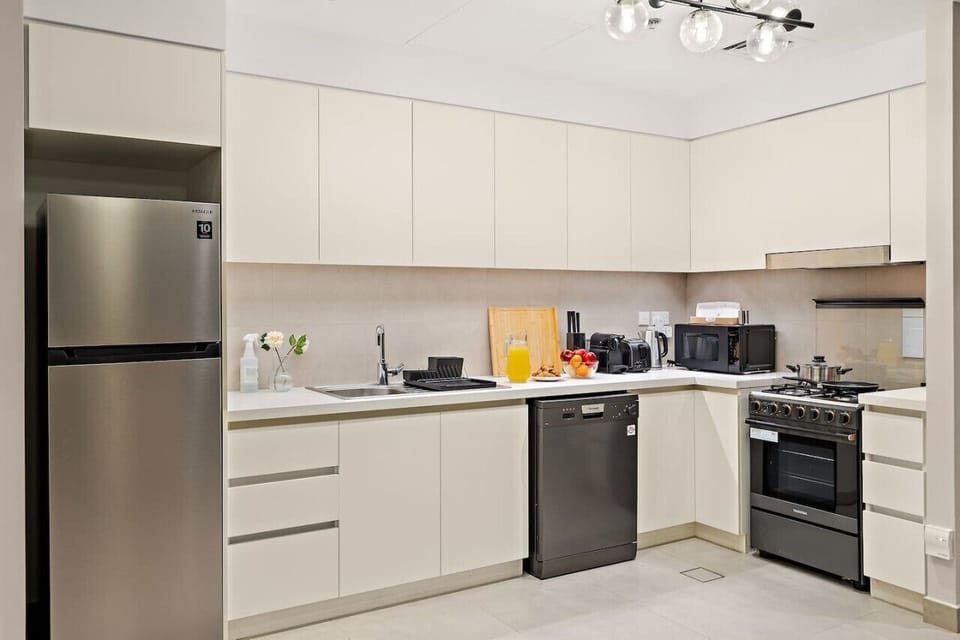 Modern Kitchen: Whip up delicious meals in this sleek, fully-equipped culinary paradise!