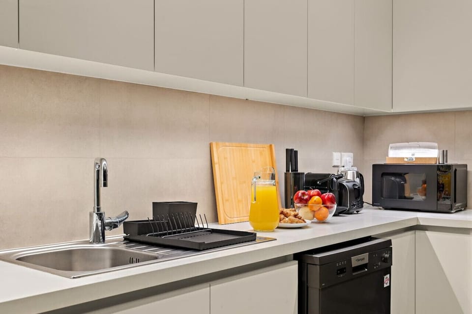 Modern Kitchen: Whip up delicious meals in this sleek, fully-equipped culinary paradise!