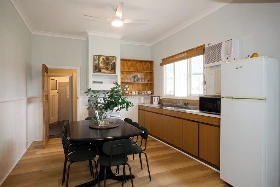 Cook and dine together in a well-equipped kitchen space.
