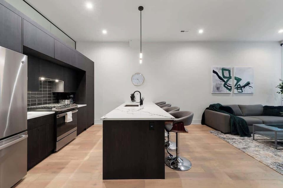 Sleek kitchen setup ideal for quick snacks or full dinners.