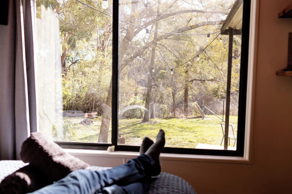 The bed is a raised custom built bed to take advantage of the beautiful view.