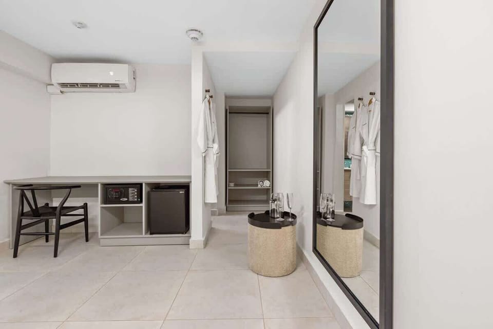 Neutral color scheme creates a calming backdrop for the room.