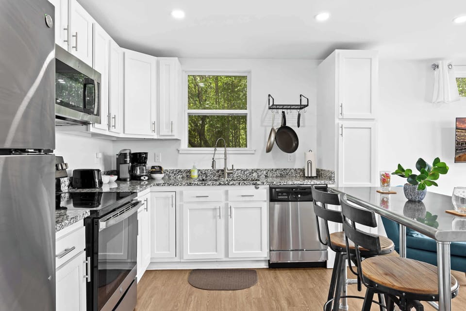 Kitchen: Enjoy cooking in our fully equipped kitchen with stainless appliances and ample natural light