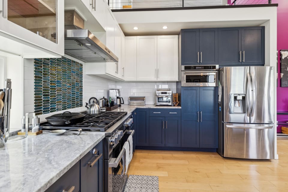 Chef's kitchen with gourmet appliances.