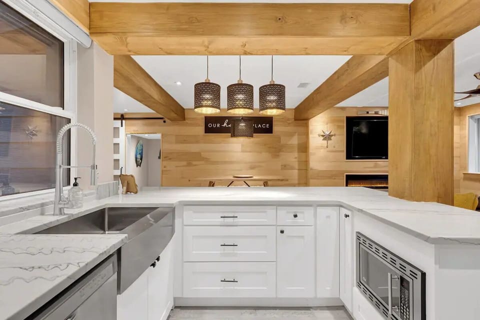 Large farm sink as part of the modern and functional kitchen design.