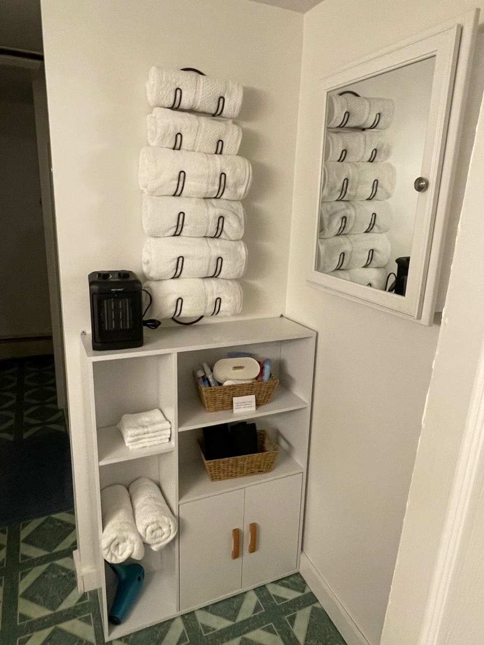 Plenty of towels for guests, plus a first aid kit- just in case. 