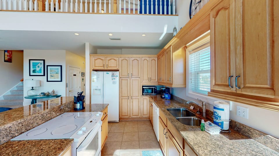 A beautifully crafted kitchen inspires the culinary enthusiast in all of us. Here, you'll find everything you need to prepare and share your favorite meals in your home away from home retreat.