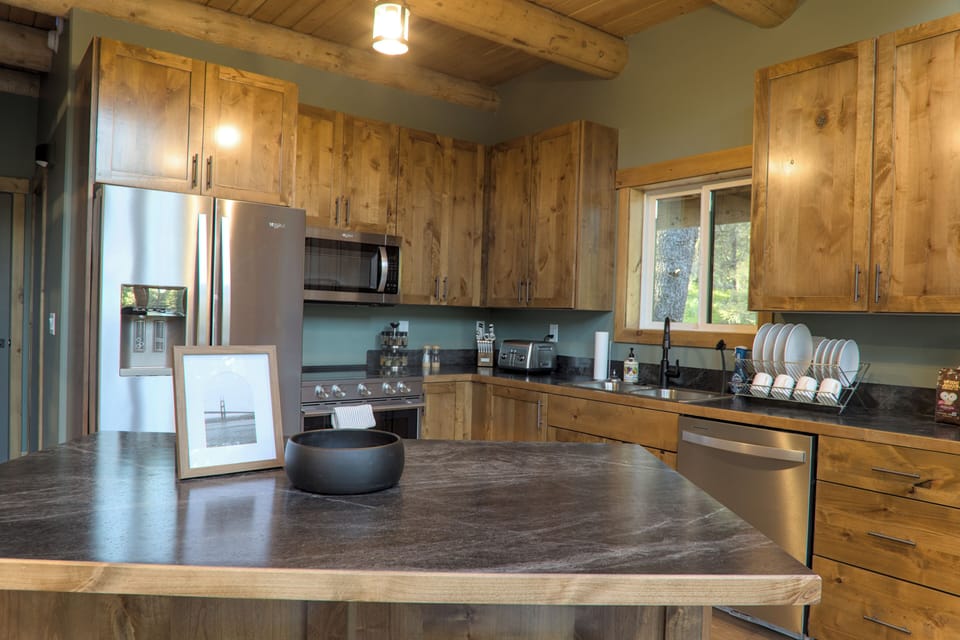 kitchen has a toaster and dishwasher