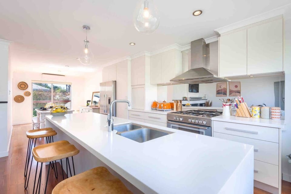 Large kitchen island with bar stools 