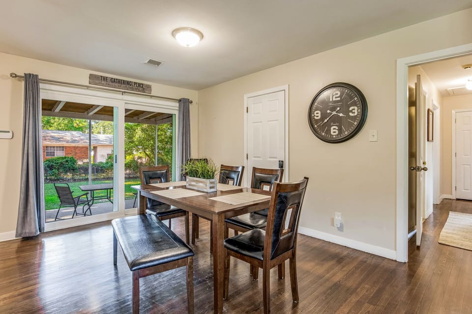 Dining room for meals, and access to the backyard.