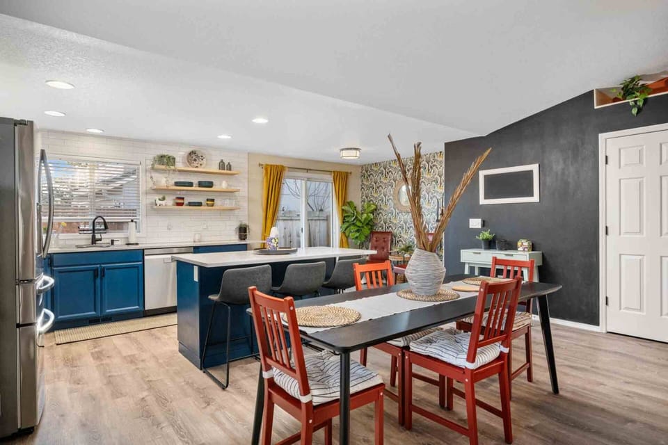 The open kitchen and dining room is the perfect place to make a feast!