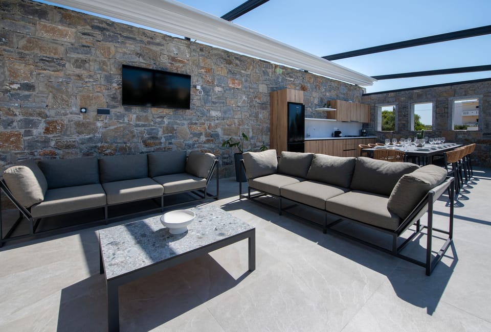 Relax in our spacious outdoor lounge area featuring also a Smart TV.
