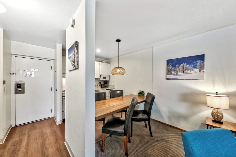 Your stylish open-plan living flows seamlessly from cozy seating to elegant dining and modern kitchen—perfect for memorable meals together.