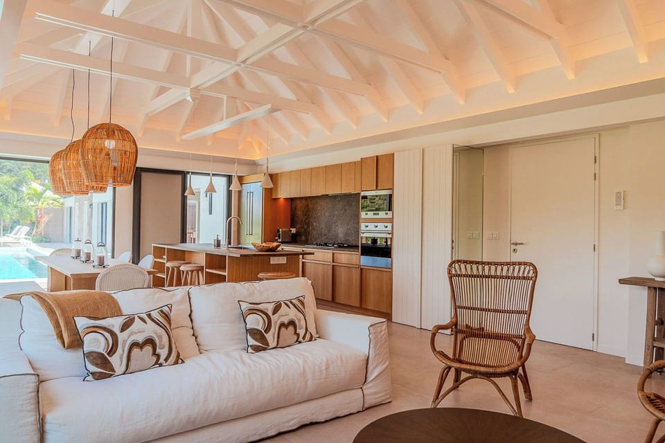 Air-conditioning, large HD-TV with Dish Network, Apple TV, iPod dock. The living room opens onto the terrace. 