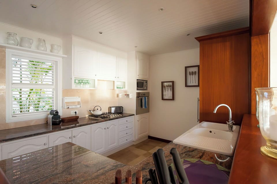Fully equipped kitchen, electric oven, gas stove, dishwasher, fridge and freezer, ice machine, microwave, toaster, filter coffee maker, and espresso coffee machine, blender. Outdoor dining rectangular table on the covered terrace. Another dining table is 