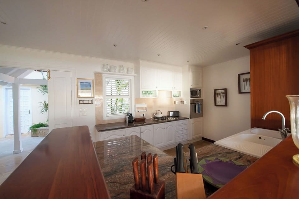 Fully equipped kitchen, electric oven, gas stove, dishwasher, fridge and freezer, ice machine, microwave, toaster, filter coffee maker, and espresso coffee machine, blender. Outdoor dining rectangular table on the covered terrace. Another dining table is 