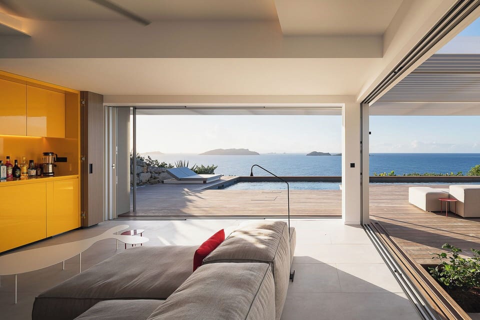 Air conditioning, HD-TV, Dish Network, DVD player, iPod docking station, stereo. The living room opens onto the expansive terrace and the panoramic views. 