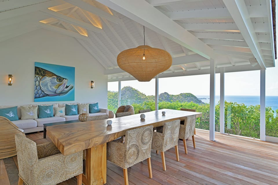Outdoor dining table on the covered terrace. 