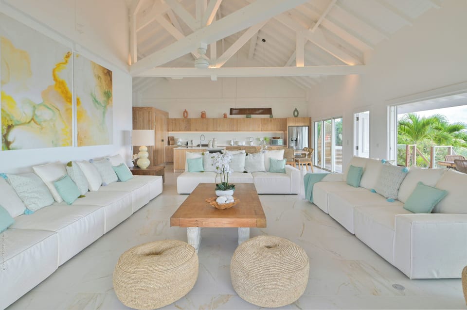Air conditioning, ceiling fan, HD-TV, Dish network, DVD player, Apple TV. Outdoor lounge area on the covered terrace.