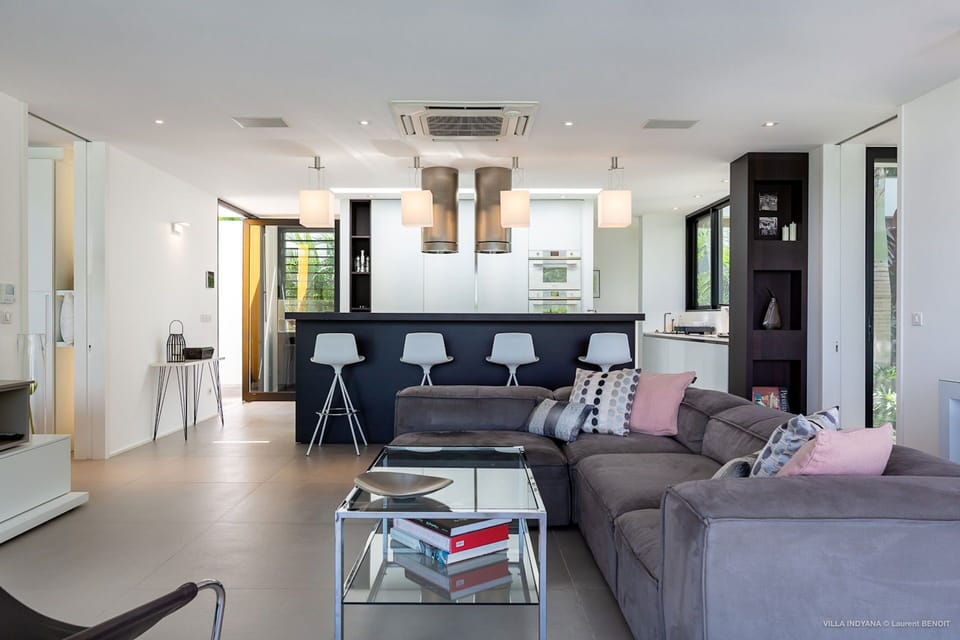 Air-conditioning, large HD-TV with Dish Network, Apple TV, iPod dock. The living room opens onto the terrace. 