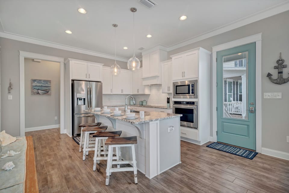 Enjoy breakfast at the oversized kitchen island before hitting the beach!!