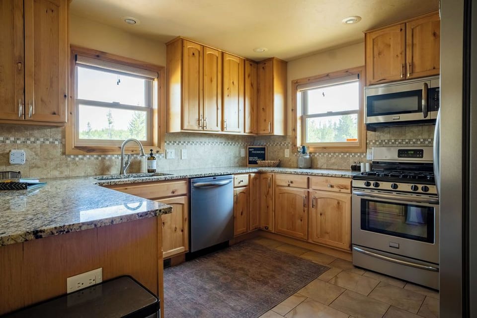 Large kitchen with granite countertops. Great for cooking and entertaining.