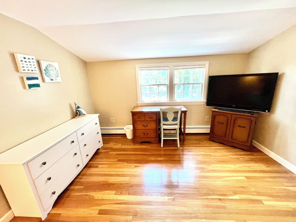 King bedroom with workspace and great views while you get some work done. TV