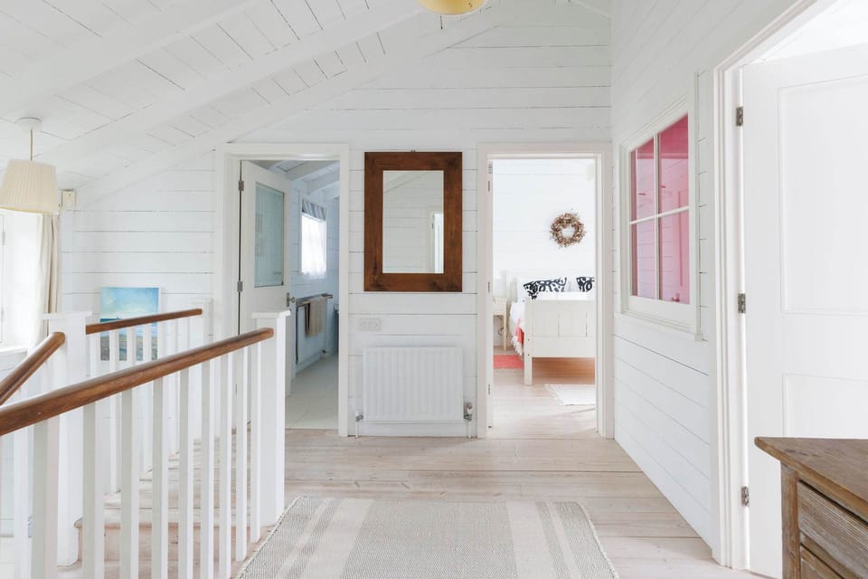 The hallway showing the family bathroom and bedroom 2