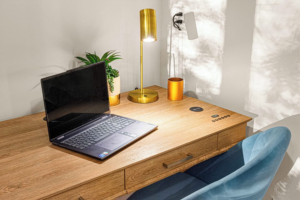 Stay productive (or at least look like it) at the desk in the master suite.