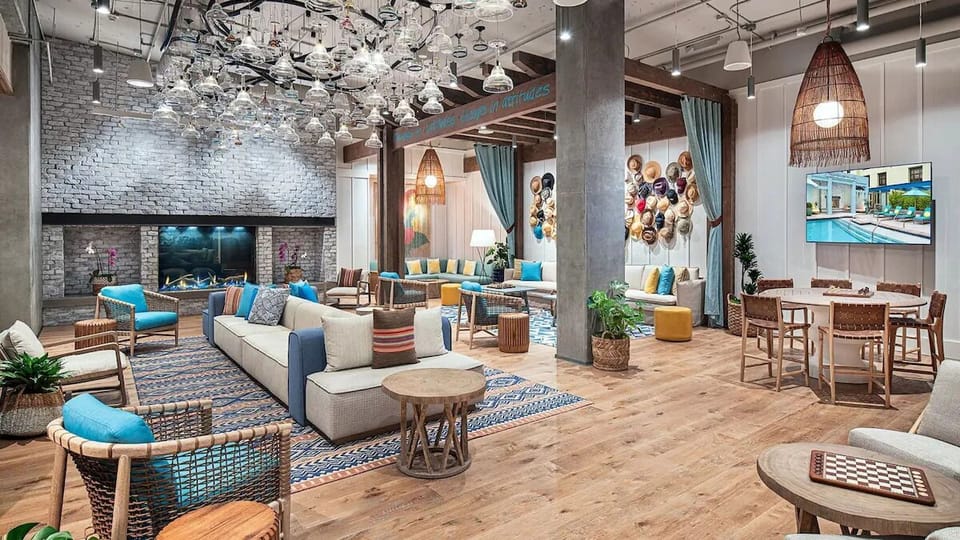 Gather with friends in a stylish lounge beside the fireplace.