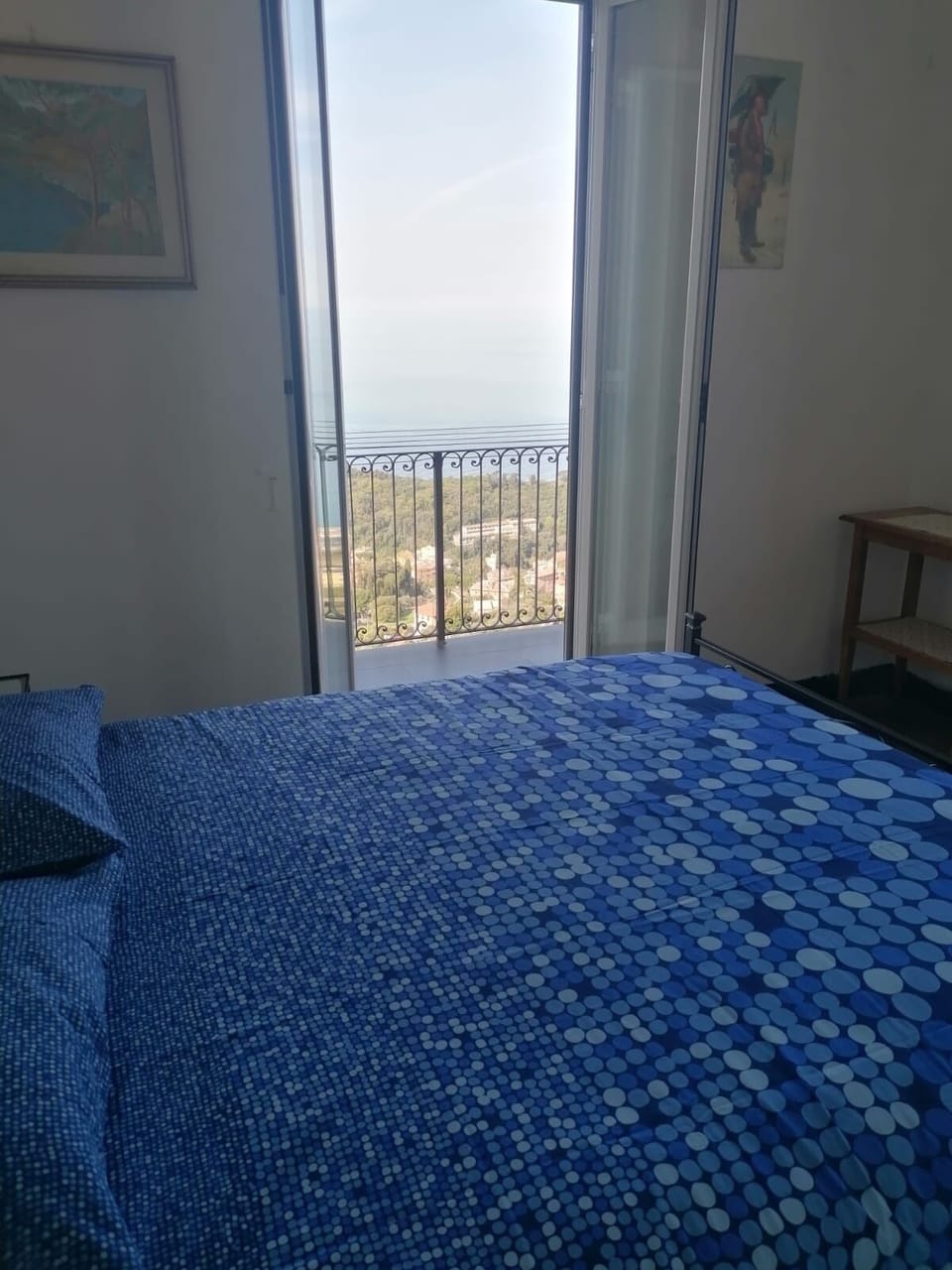 Master bedroom with balcony access