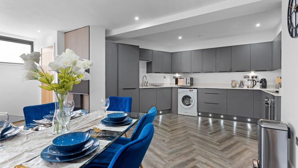 Open-plan kitchen and dining area for a spacious, social cooking and dining experience.