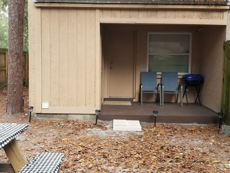 Back Patio with grill (laundry room is to the left).