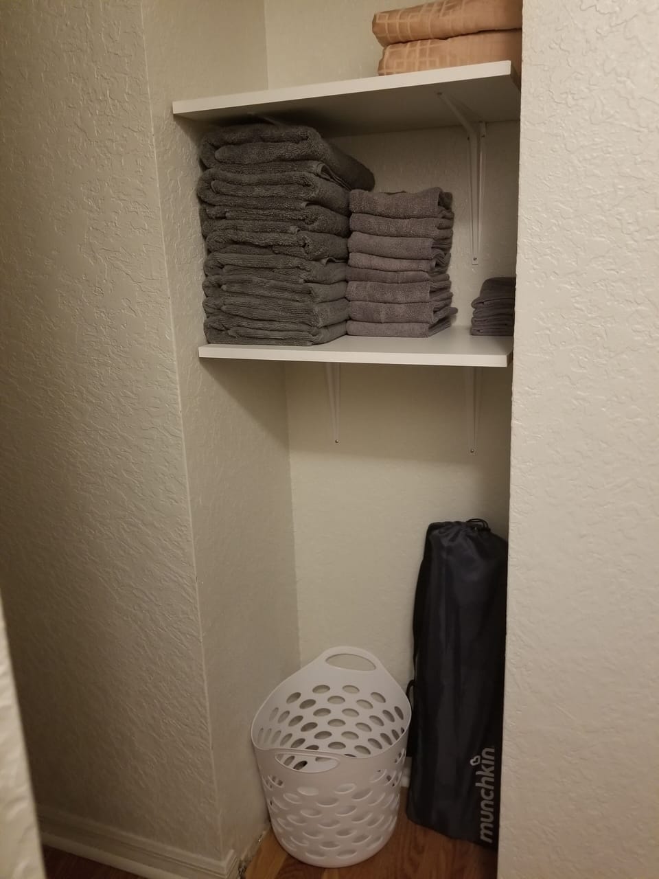 Towels, Hand towels, wash clothes, basket and baby gate.