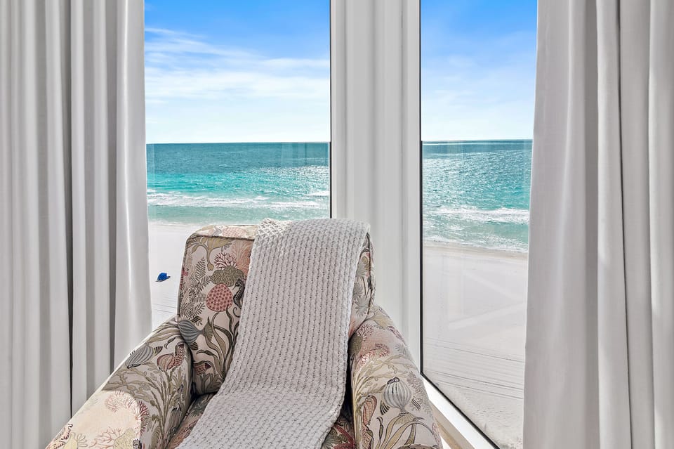 Settle into your private oceanfront escape where turquoise waves and pristine sand create the perfect setting for morning coffee or evening relaxation.