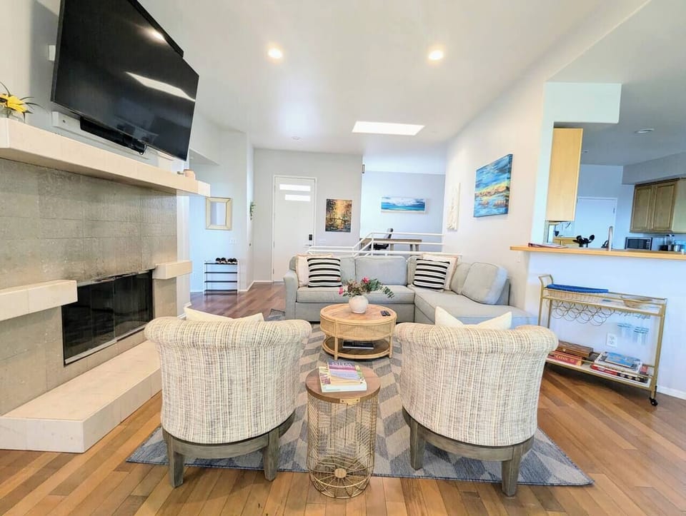The living room, kitchen, dining,  first master suite with full bath, half bath are on first floor 